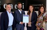 Consegna di certificato a Genesi