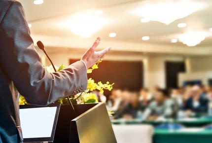 man speaking meeting